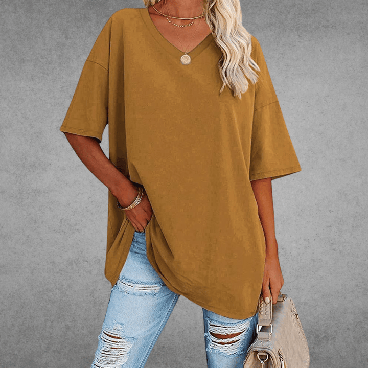 T-shirt décontracté femme coupe ample et col V, polyvalent pour diverses tenues estivales.