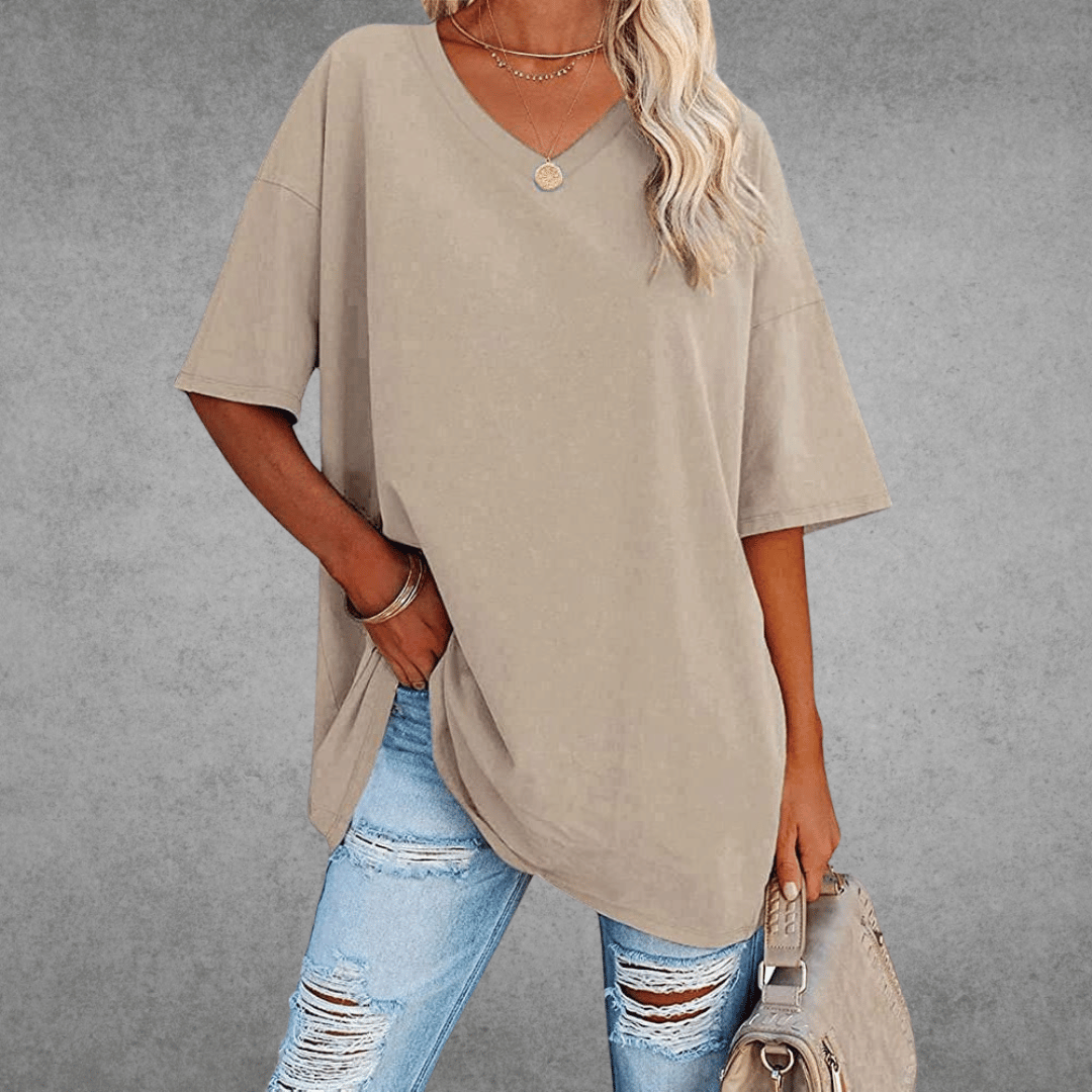 T-shirt oversize blanc femme col V, look décontracté, confort idéal pour le quotidien.