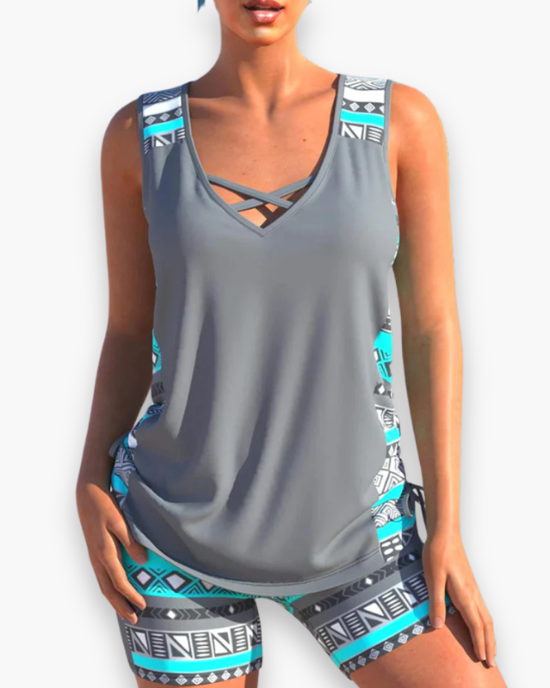 "Tankini élégant femme deux pièces, coupe flatteuse, matière douce, idéal pour plage et piscine, confort et style assurés."