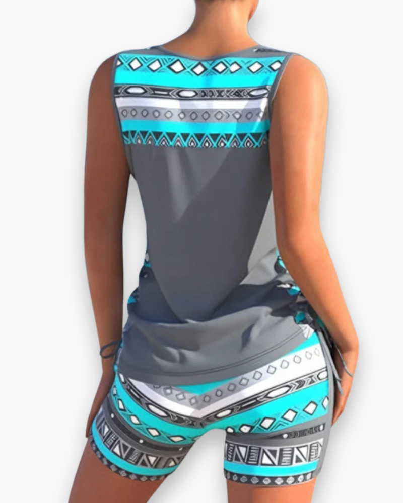 "Tankini élégant femme deux pièces, coupe flatteuse, matière douce, idéal pour plage et piscine, confort et style assurés."