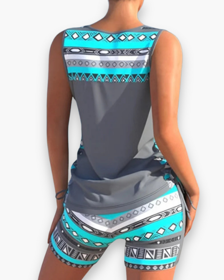 "Tankini élégant femme deux pièces, coupe flatteuse, matière douce, idéal pour plage et piscine, confort et style assurés."