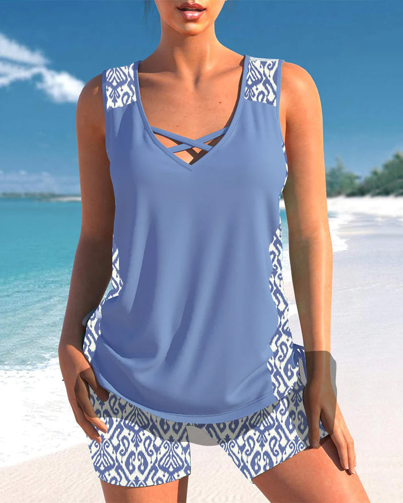 Maillot tankini femme moderne à motifs géométriques, coupe élégante et confortable pour l'été.