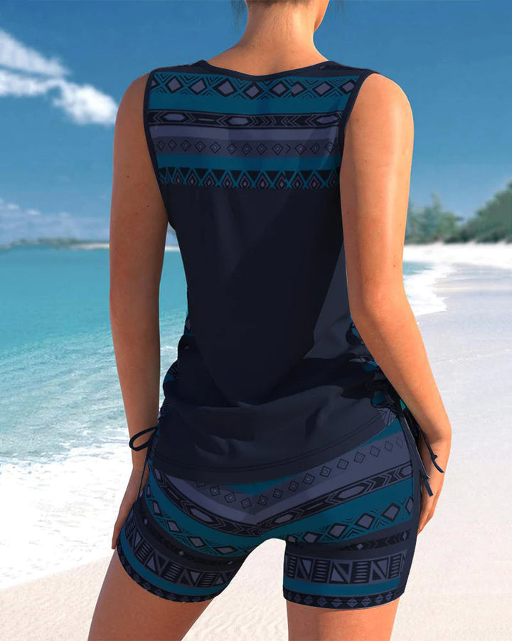 Tankini femme géométrique, élégant maillot deux-pièces offrant couvrance et confort pour l'été.