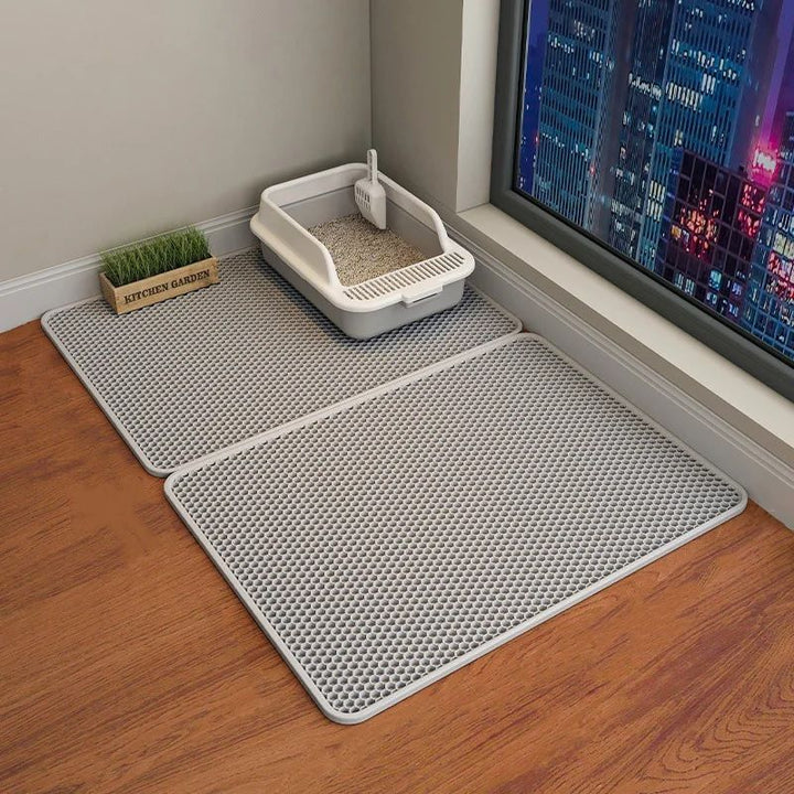 Tapis alvéolé imperméable antidérapant pour litière chat.  Protège sols, récupère litière.