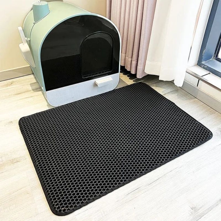Tapis alvéolé imperméable antidérapant pour litière chat.  Protège sols, récupère litière.