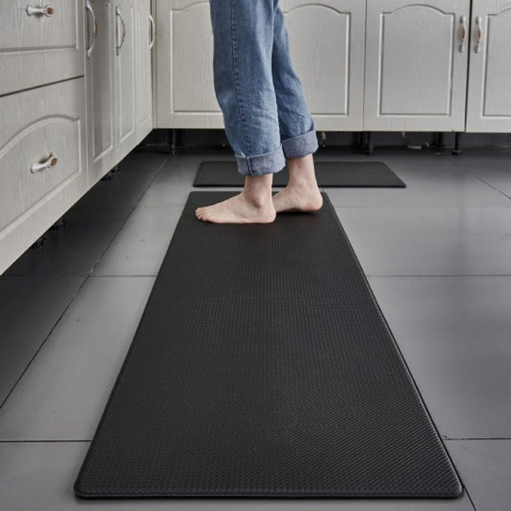 "Tapis de cuisine noir, antifatigue, ergonomique, antidérapant, soulage pieds, design élégant, bords biseautés"