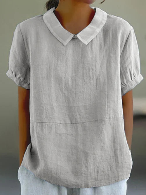 "Top chic unisexe en coton et lin, style minimaliste, couleurs élégantes, confort respirant, parfait pour tenue décontractée.