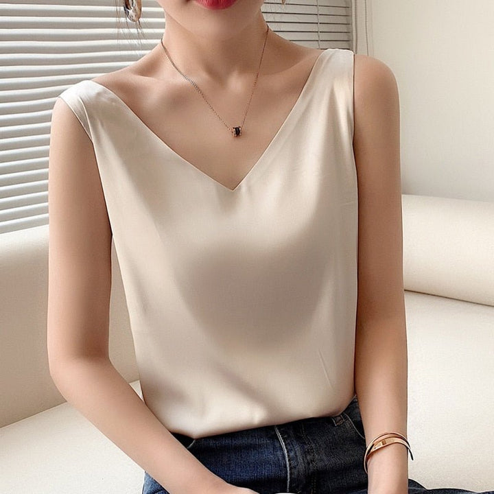 Top femme polyvalent, col en V, style décontracté chic, essentiel pour la garde-robe printemps/été.