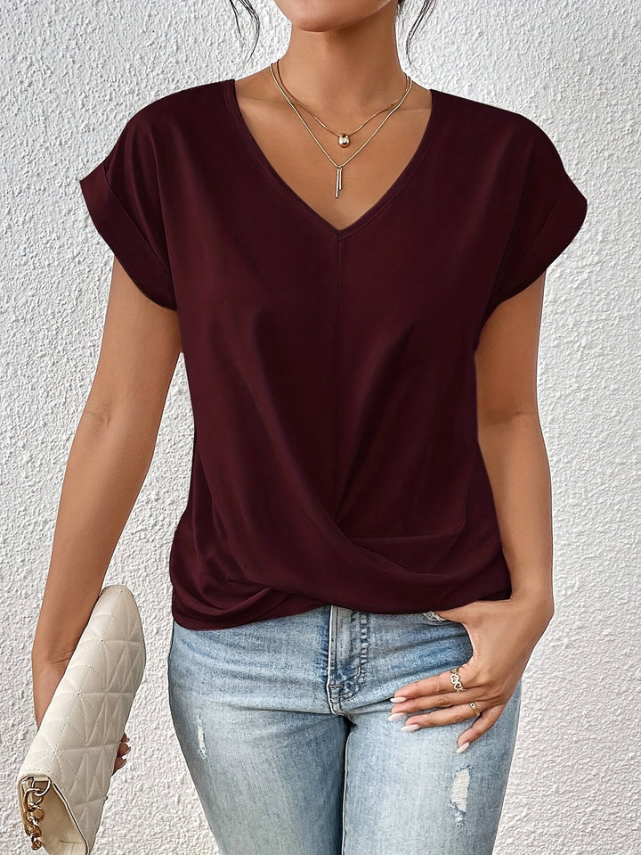 Blouse femme élégante Yasmine à col V et nœud, avec drapé. Parfaite pour un style chic et moderne.