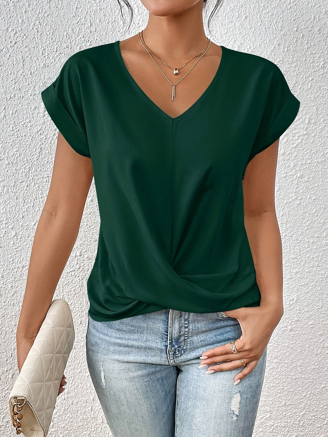 Élégant top femme Yasmine col V, avec nœud chic, pour un style polyvalent et décontracté. Haut mode.