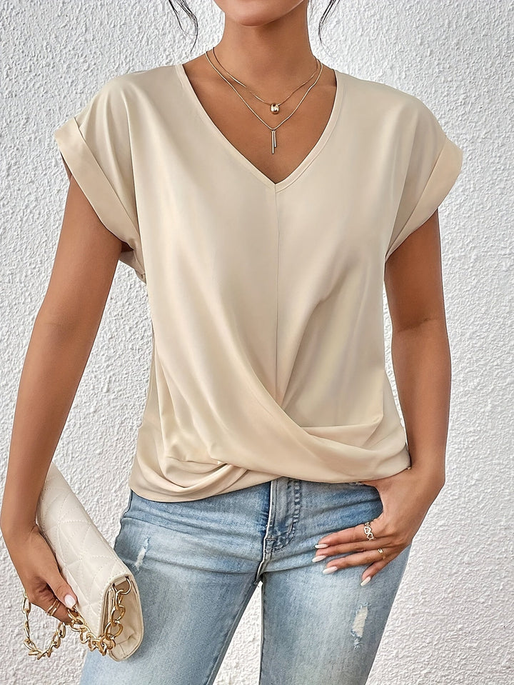 Top Yasmine chic à col V et nœud élégant. Haut polyvalent drapé pour une mode féminine stylée.