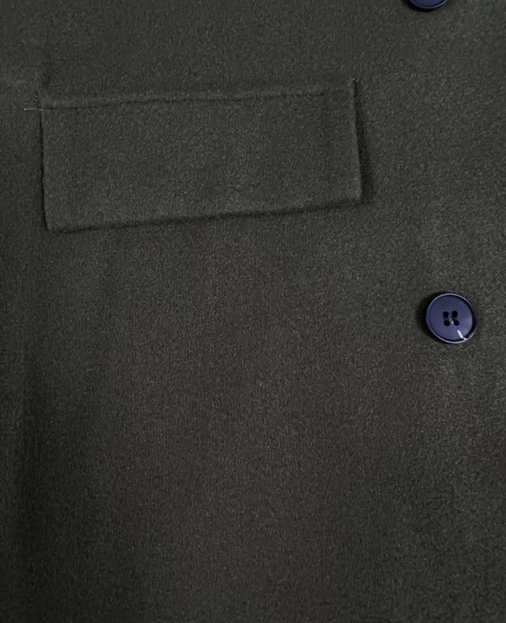Manteau femme intemporel, trench long ajusté, parfait pour la mi-saison.