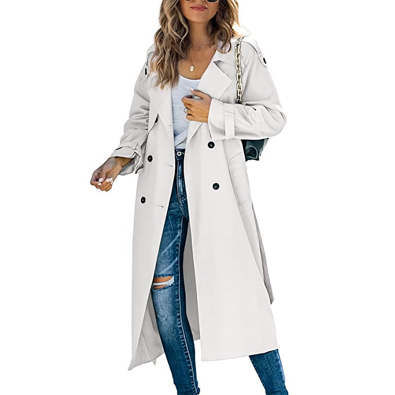 Trench-coat long femme élégant, idéal pour le printemps et l'automne. Manteau mi-saison beige coupe-vent et tendance.
