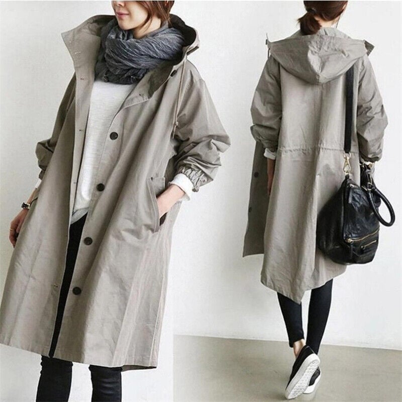 Trench imperméable élégant, coupe flatteuse, capuche.  Parfait pour l'automne et l'hiver.