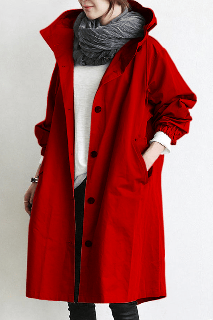 Trench imperméable élégant, coupe flatteuse, capuche.  Parfait pour l'automne et l'hiver.
