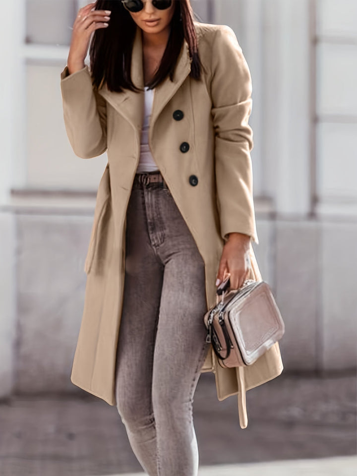 Manteau trench long femme, couleur neutre, idéal pour l'automne-hiver. Veste élégante et intemporelle.