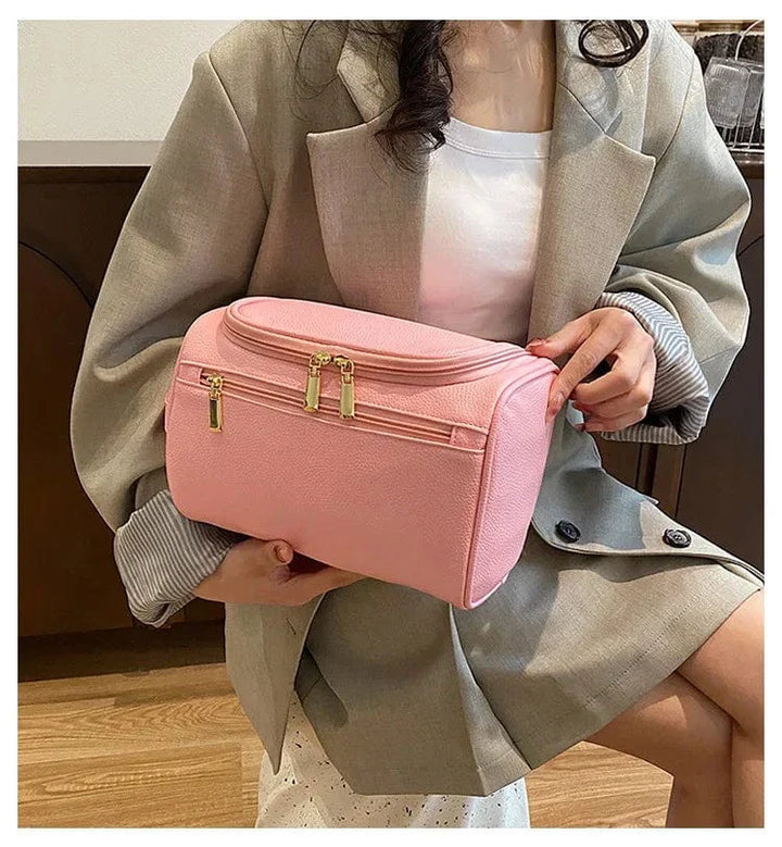 Trousse d'organisation rose pour maquillage femme, en cuir PU, un indispensable pour les voyages et la salle de bain.