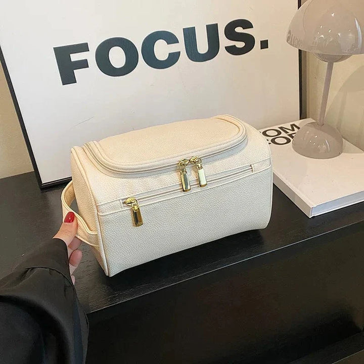 Trousse polyvalente en cuir PU rose pour femmes, range maquillage, accessoires, idéale pour la maison ou les voyages.