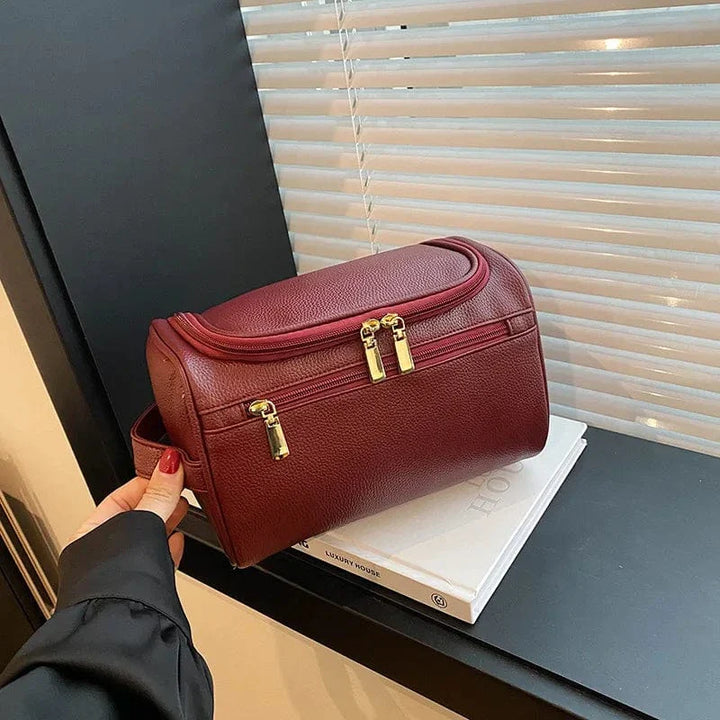 Trousse de maquillage rose pastel pour femmes, en cuir PU doux, un accessoire élégant pour emporter vos essentiels.