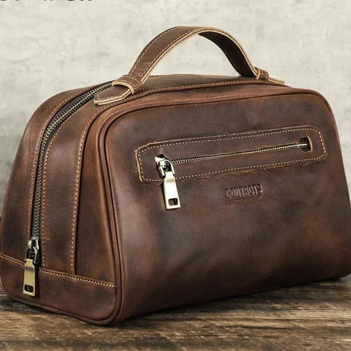 Accessoire de voyage luxe: trousse de toilette homme en cuir, fermeture éclair robuste, organisateur interne