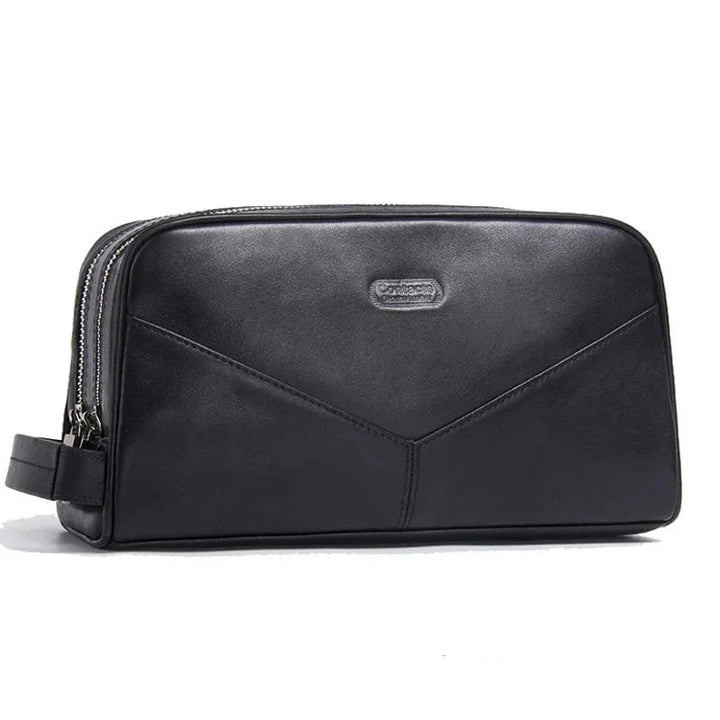 Organisation voyage : trousse homme en cuir pleine fleur, disponible en marron, noir et café pour vos besoins.