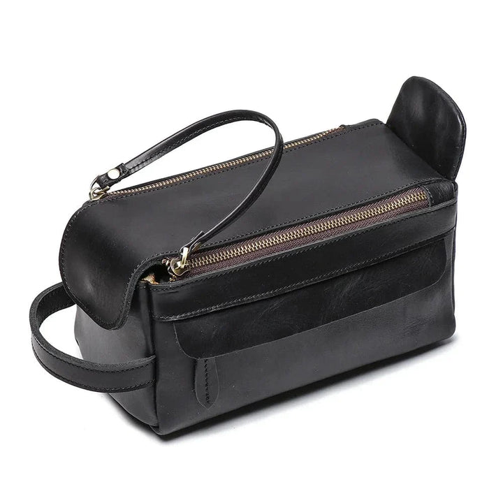 Trousse de toilette compacte en cuir vintage pour homme, avec boucles et détails métalliques