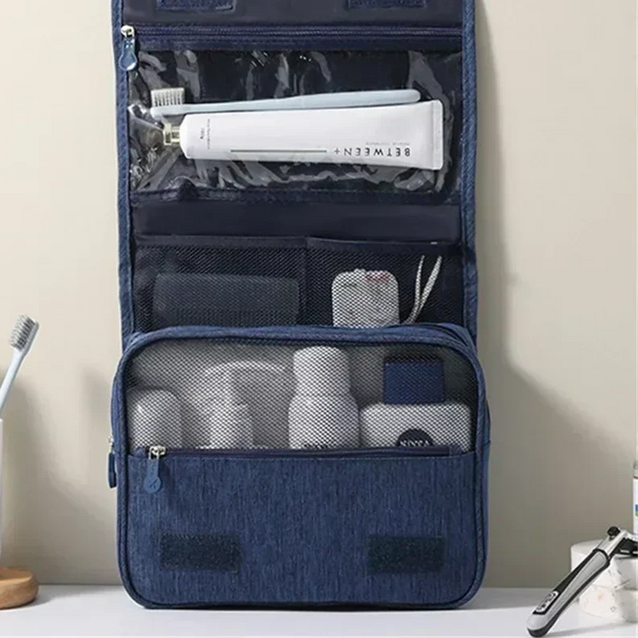 "Trousse de toilette imperméable, design compact et élégant avec multiples compartiments, idéale pour voyage organisé."