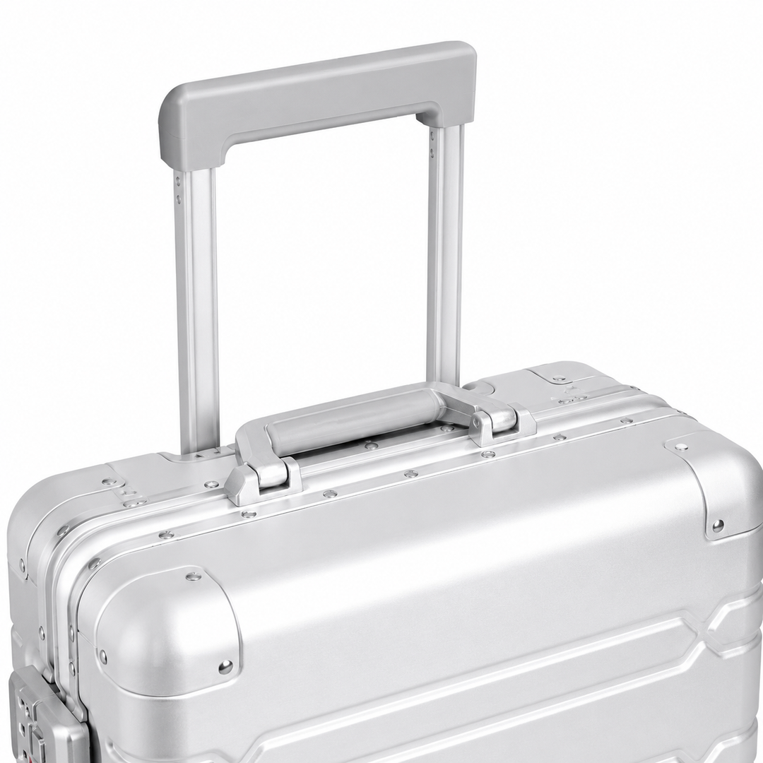 Valise VORHA Vauban en aluminium avec roues trolley, conçue pour un transport facile et sécurisé.
