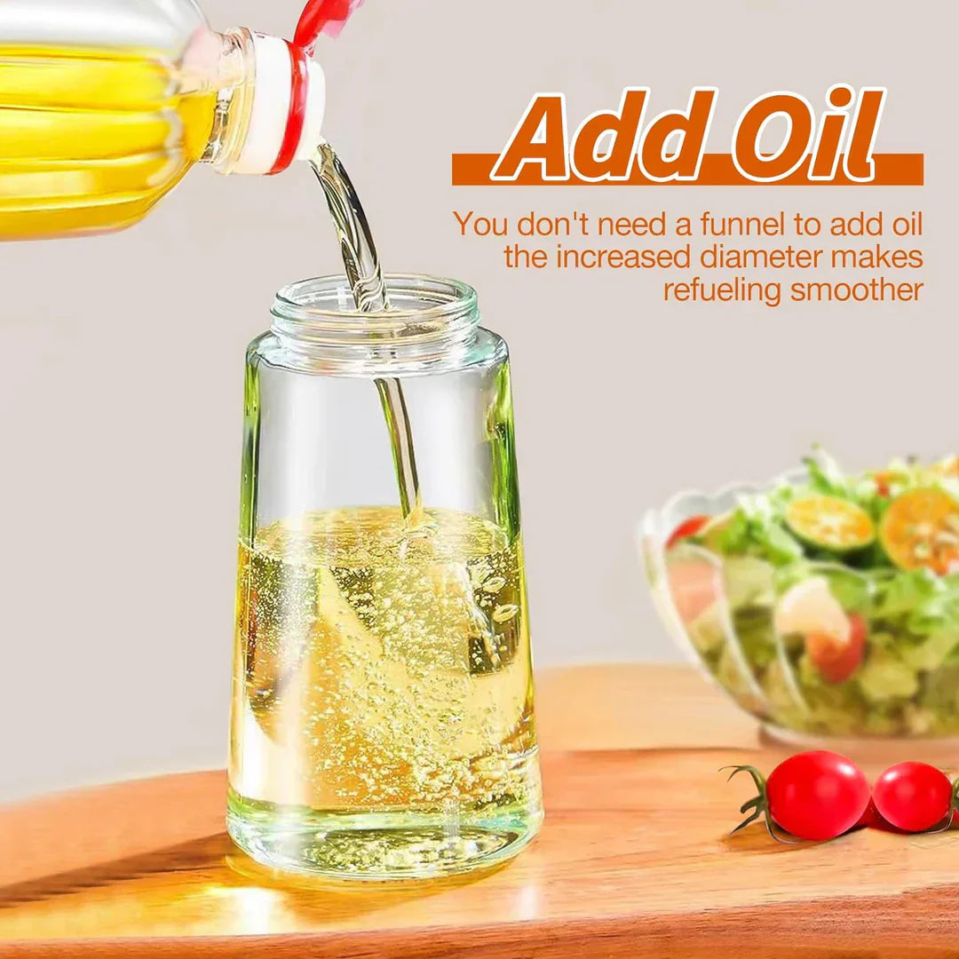 Vaporisateur d'huile 2 en 1 en verre, fonction spray et versement, idéal cuisine précise et économique, design élégant.