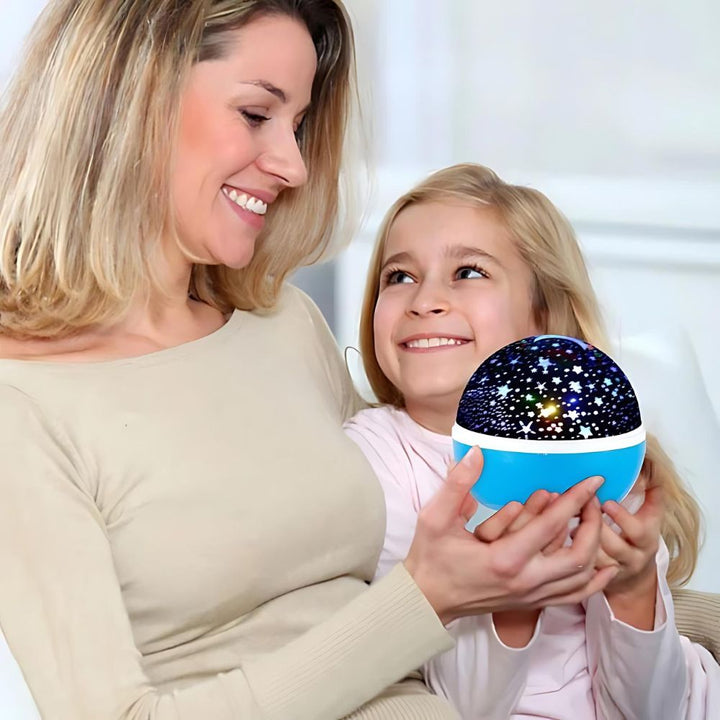 "Veilleuse bébé projection plafond étoilée, ambiance apaisante, disponible en bleu, mauve, noir et rose pour chambre enfant."