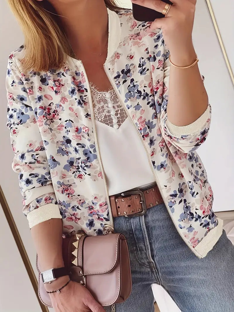 Veste bomber femme, imprimé floral léger, coupe chic et confortable.  Idéal mi-saison.
