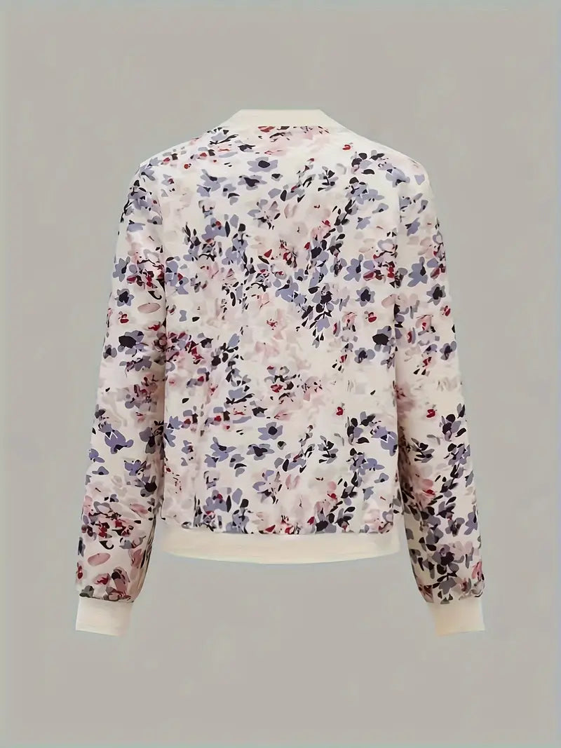 Veste bomber femme, imprimé floral léger, coupe chic et confortable.  Idéal mi-saison.