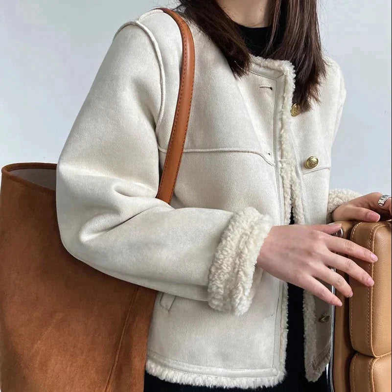 Veste bomber femme Stevie polyvalente marron/blanc. Style hivernal raffiné, confortable et à la mode.
