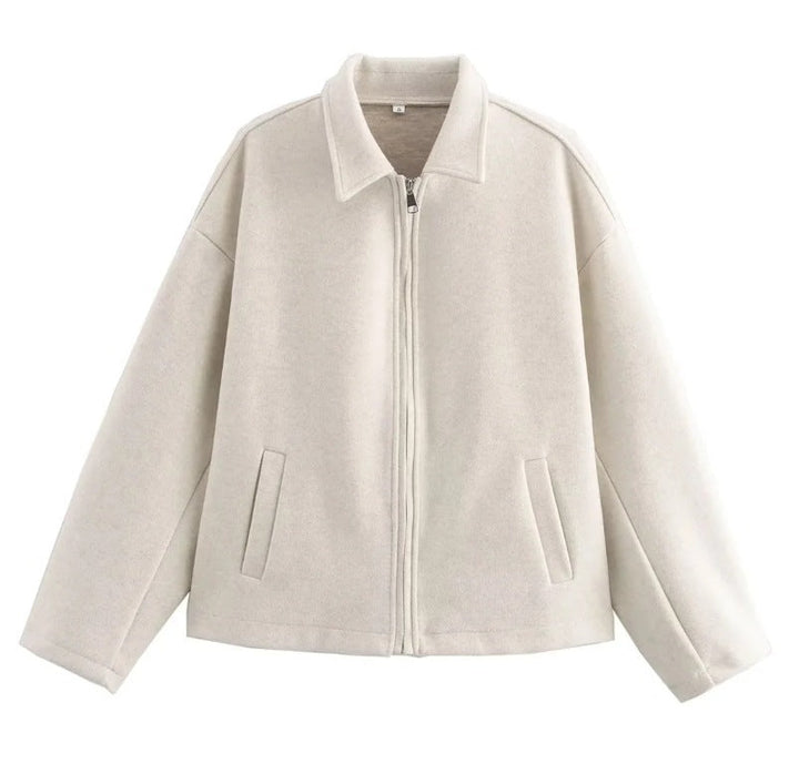 Veste courte casual femme, design moderne et élégant. Fermeture éclair pratique pour un confort optimal.