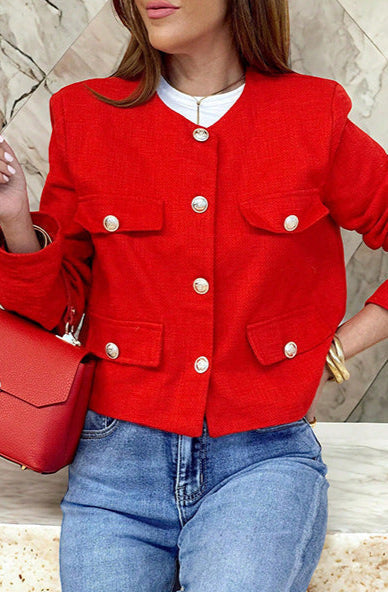 "Veste cropped vintage pour femme, coupe courte, détails élégants, style chic et sophistiqué."