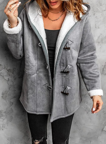 Manteau décontracté femme pour l'hiver, chaud, avec capuche protectrice, allie confort et mode.