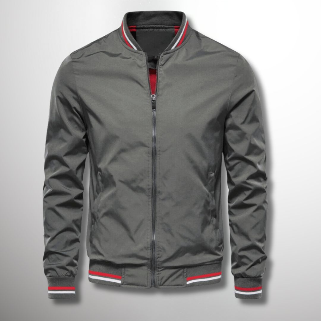 "Veste de transition homme élégante, coloris bleu foncé, design moderne avec détails soignés pour entre-saisons."