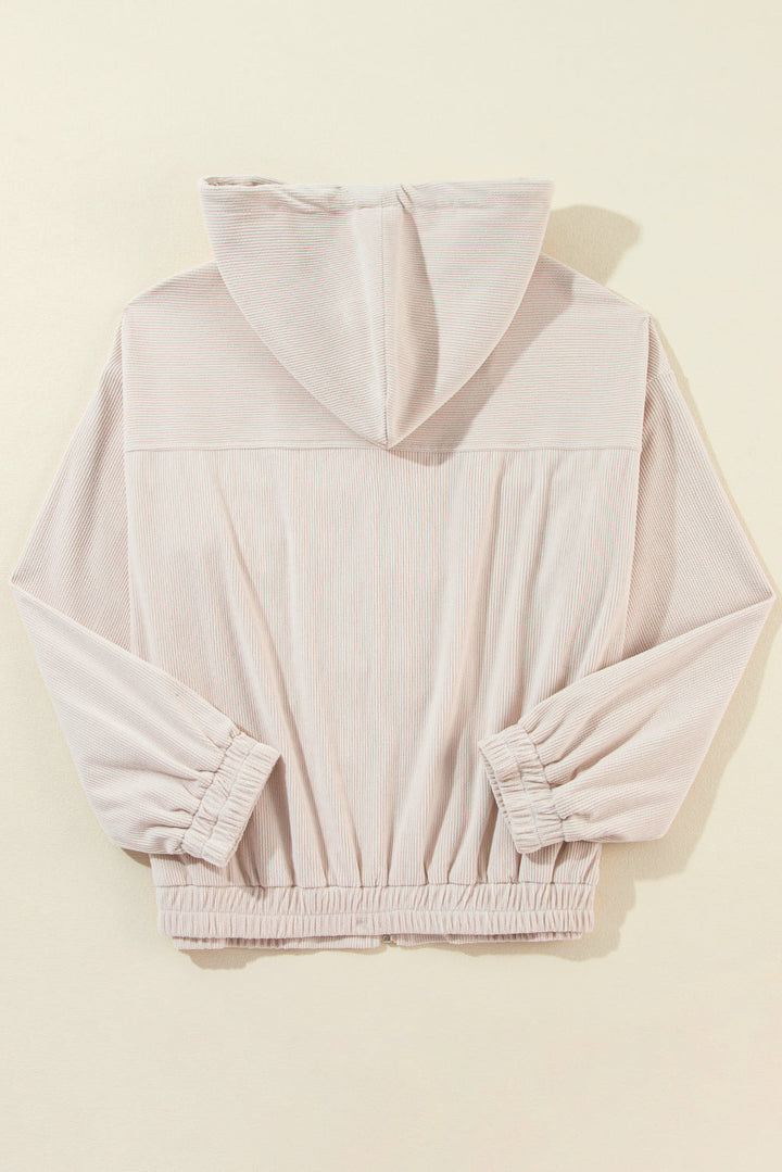 "Veste décontractée velours côtelé marron avec capuche, coupe fluide pour femmes, élégante et tendance"