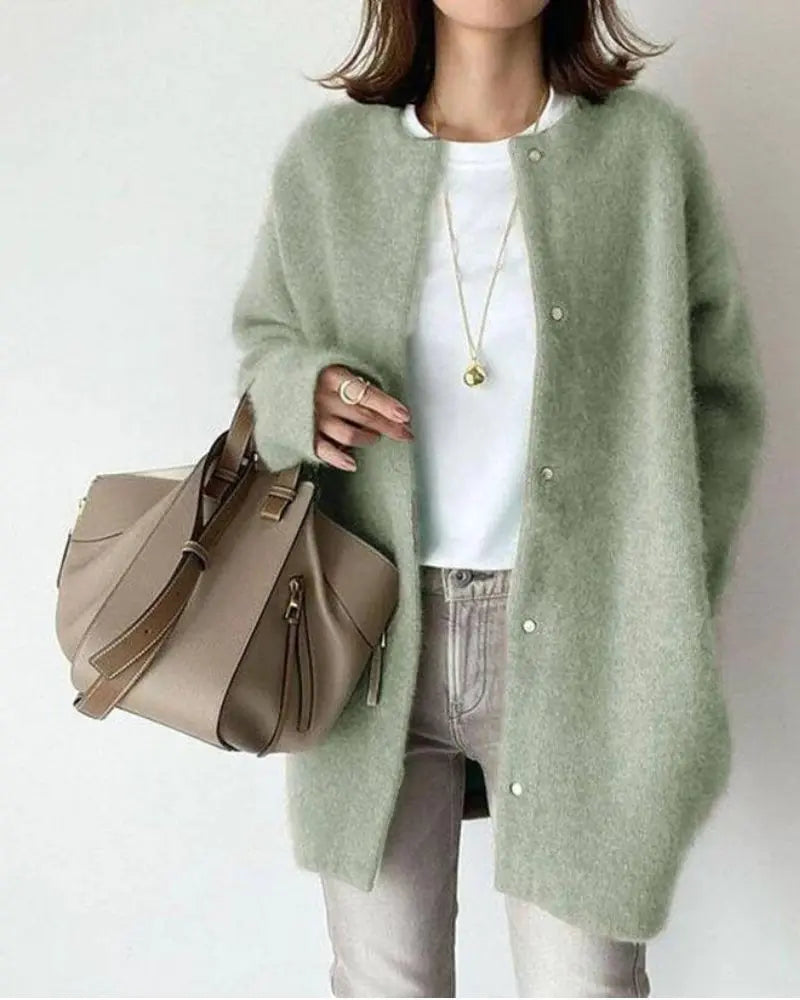 Veste élégante femme, coupe flatteuse, idéale automne.  Tissu chaud, style chic et décontracté.