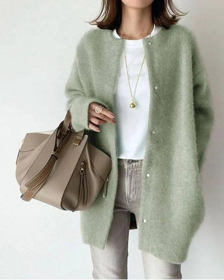 Veste élégante femme, coupe flatteuse, idéale automne.  Tissu chaud, style chic et décontracté.