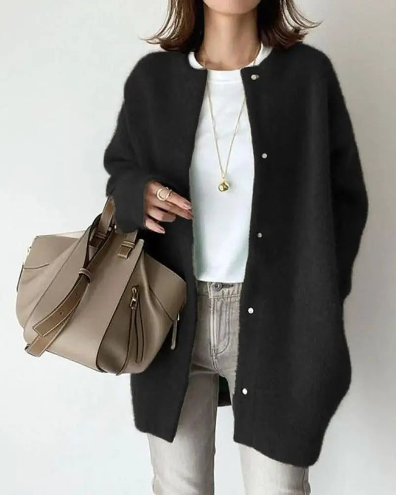 Veste élégante femme, coupe flatteuse, idéale automne.  Tissu chaud, style chic et décontracté.
