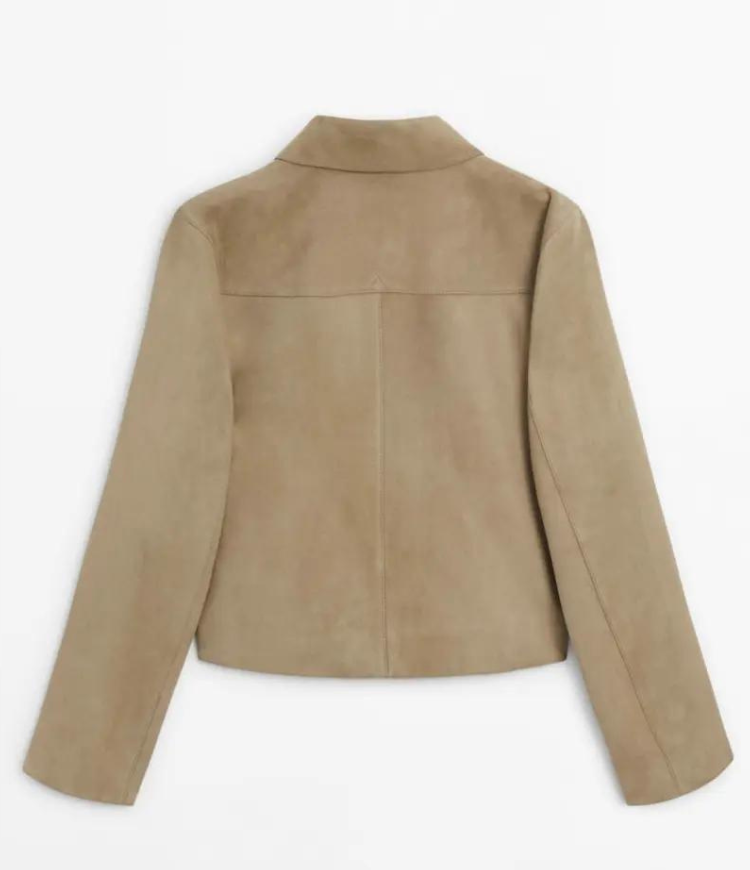 "Veste en cuir femme Karly, coupe ajustée, design moderne, cuir souple, couleur neutre, accentue la silhouette élégante."