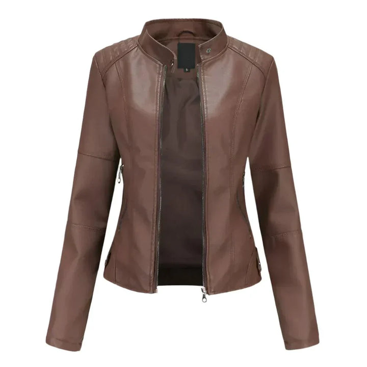 Veste femme ajustée en cuir, chic et moderne.  Coupe élégante, détails raffinés.  Idéale pour toutes occasions.