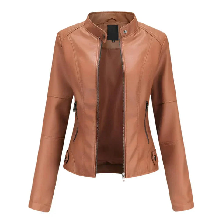 Veste femme ajustée en cuir, chic et moderne.  Coupe élégante, détails raffinés.  Idéale pour toutes occasions.