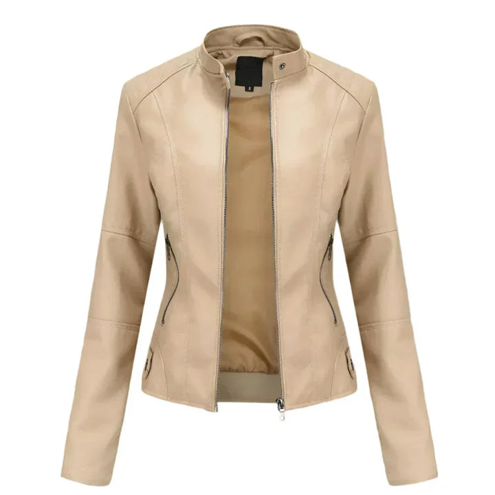Veste femme ajustée en cuir, chic et moderne.  Coupe élégante, détails raffinés.  Idéale pour toutes occasions.