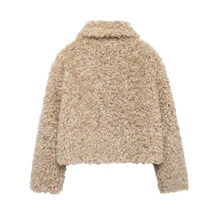 Manteau femme élégant et confortable en tissu doux avec boucles décoratives, idéal pour l'automne-hiver.