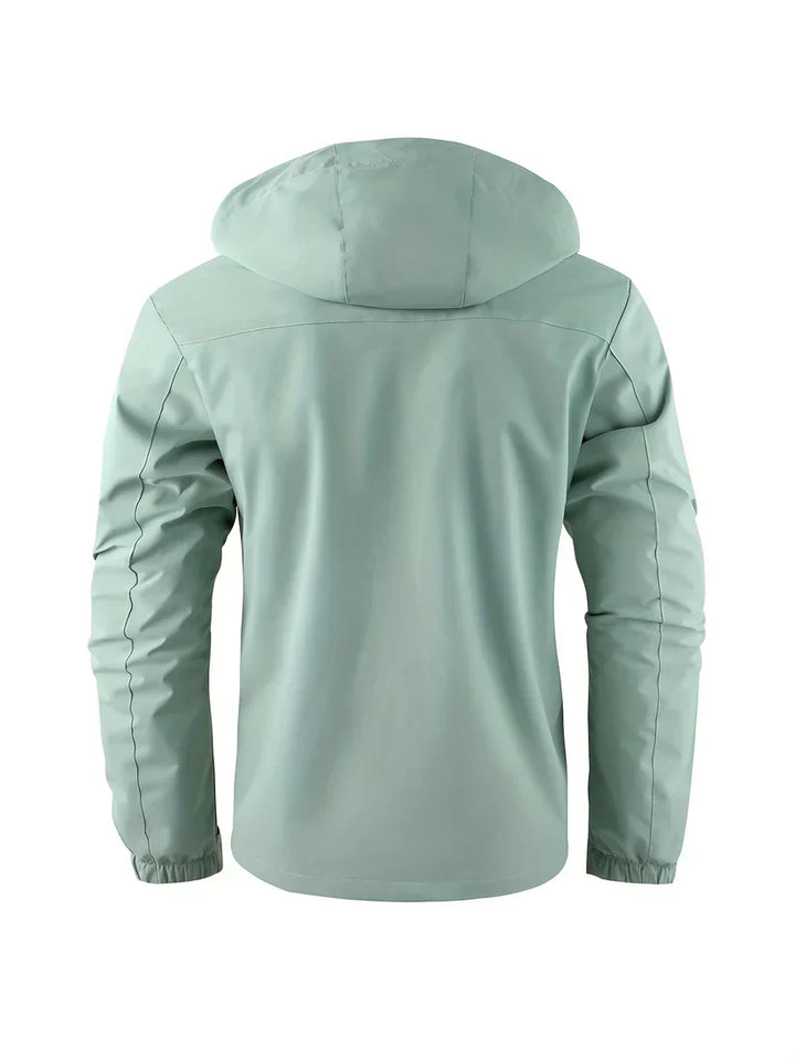 Manteau homme cargo résistant, isolant, avec capuche. Parfait pour affronter le froid et le vent.