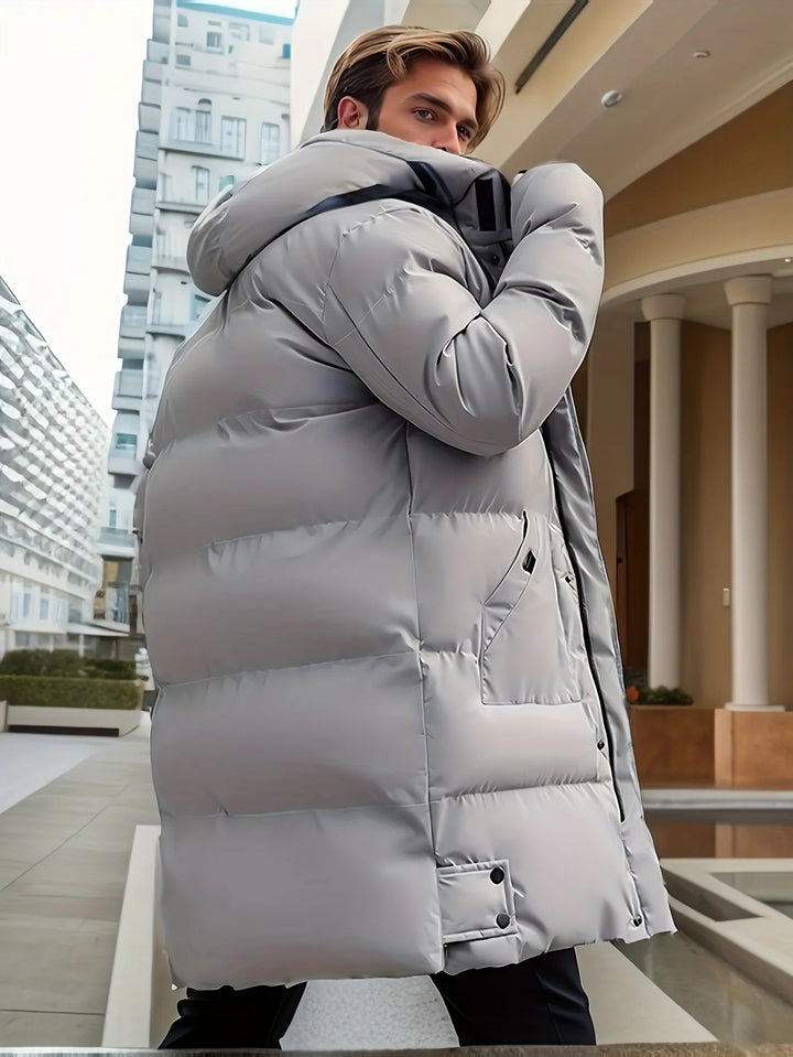 Veste homme chaude à capuche, coupe-vent.  Idéale pour l'hiver. Design élégant et confortable.