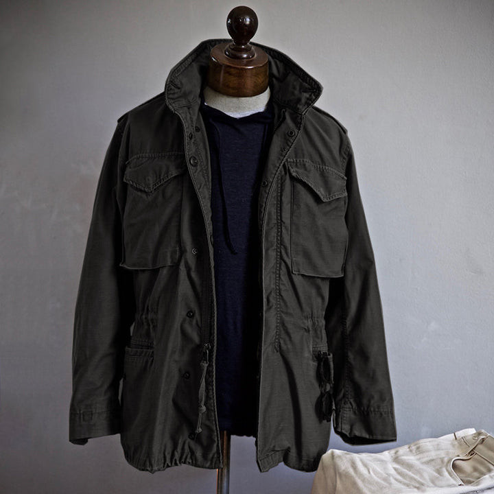 Veste homme M-65 Field fonctionnelle, coupe-vent vert. Parfaite pour le printemps/automne, mode masculine résistante et urbaine.