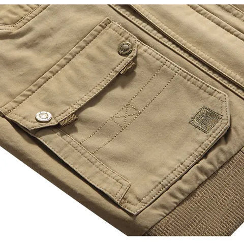 Veste homme tactique multipoches, style vintage robuste. Idéale pour l'aventure.